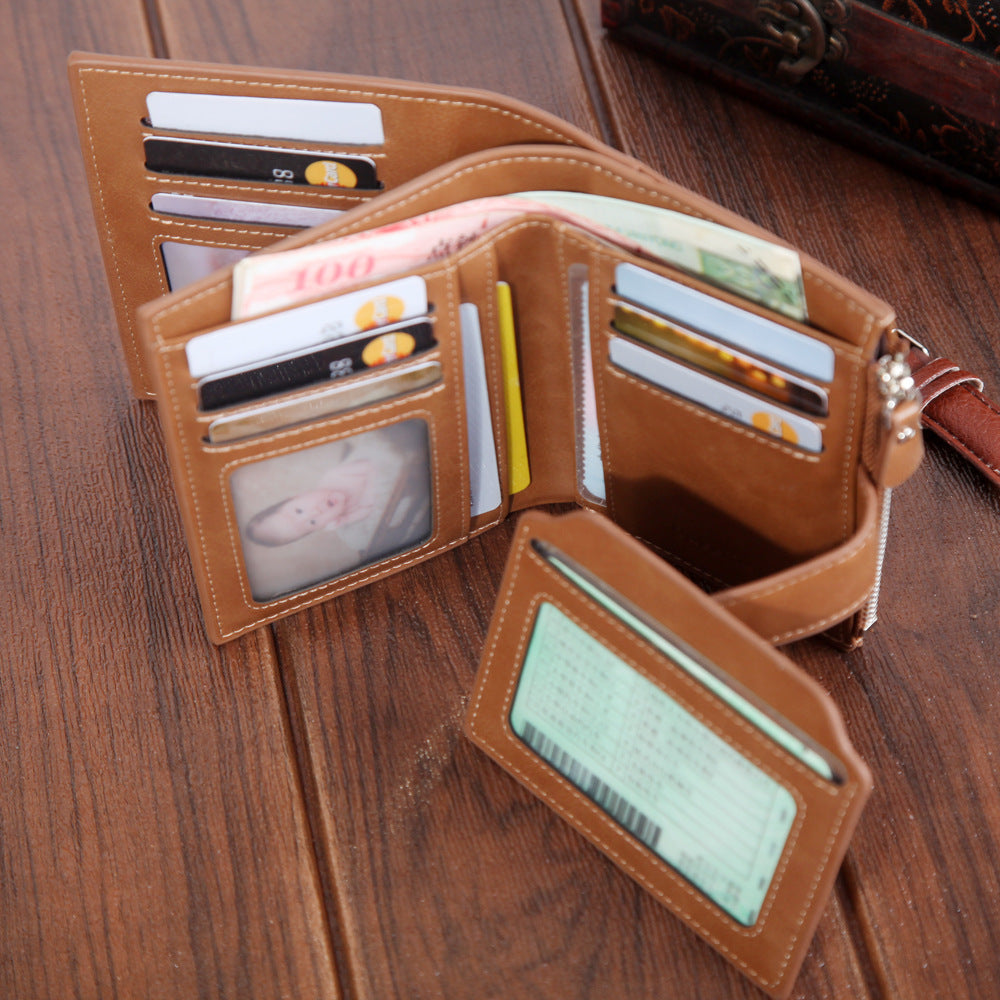 A brown wallet opened to reveal credit cards and cash neatly organized inside.